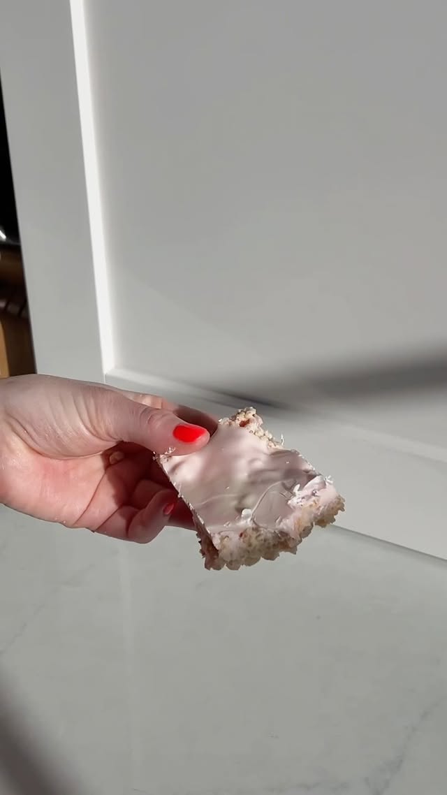 If you like a sweet snack in the summer time, these Strawberry Shortcake Rice Krispies are perfect! They are simple to make, but with a fun summer twist! 6 cups Rice Krispies cereal12 oz bag of marshmallows4 tbsp unsalted butter1c freeze dried strawberries *I didn’t use a specific amount really, just as much as I wanted 😊*2.5 bags of Ghirardelli white chocolate wafer meltsAngel food cake globs 😇 (skip this step if you want to make the recipe GF!)Grease your baking pan and set aside.In a large microwave safe bowl, add butter & marshmallows. Microwave for about 60 seconds and then check. If the marshmallows have puffed up and butter has melted, take it out and stir. Pour in the Rice Krispies and mix. Next, crumble in freeze-dried strawberries and the crumbled globs of angel food cake. Mix well and pour into pan. In another bowl, microwave the white chocolate wafer melts in 60 second increments. Mix between each melt. Keep doing this until all of the chocolate has melted. Set aside for a few minutes to cool down. Once the chocolate mixture has cooled a little, add a small amount of red food coloring until you get your desired pink color. Pour over the rice Krispy treats. In a second, smaller bowl, add the remaining half bag of the white chocolate wafers and repeat the process. Set aside for a few minutes to cool down. After the pink chocolate has been poured, get an icing tool and dip it in the white chocolate and drag around the pink to make whatever design you want. I chose to make it pink marble, but there’s so many choices! Place the whole pan in the fridge and let cool for at least 30 minutes to completely set.Remove from the fridge, slice and enjoy! 🍓#summerrecipes #ricekrispies #strawberryrecipes