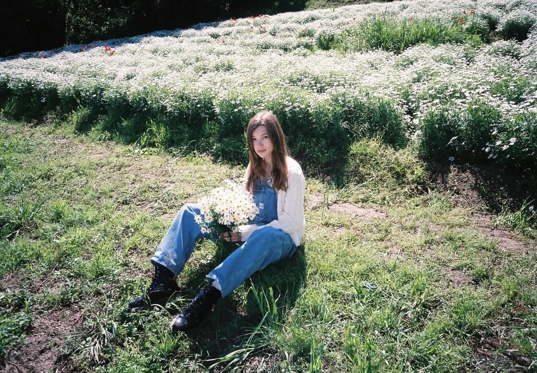 Daisies, youth and happiness 🌿These pictures feel like I went straight out of Pinterest. Like it’s a scene from a movie or the visual equivalent of a Lana Del Rey song. And it describes me so correctly. Just me.We were planning this shoot for quite a while. Not the closest location to Tokyo. Took the bullet train, rented a car, prepared outfits… and it was all worth it. I will recall this day for a longggg time. But you’ll probably get bored reading this huge review, so maybe another time)Here you can see my film photos - actually taken by @kohki , but on my baby film camera. So they still count as mine hah. And when I got them back after this trip, I fell in love - with the colours, with the details, with the moments, with the angles, with the wind, and with the memories.My film photos are parts of my soul and heart. And here I am, sharing my heart with you. Thank you 🤍 take care of it by @kira_zhura
