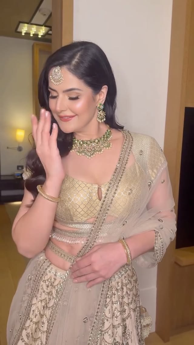 Feeling truly Royal in this gorgeous outfit by @anjumodi ji.Loved being your muse for the @timeslifestyleweek in Delhi.Make up by @bijoyjeet.saikia_makeupartistHair by @hairbyasad_ali #Bridal #Traditional #Couture #Muse #ZareenKhan by @zareenkhan