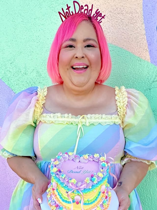 “NOT DEAD YET!!!”💖🎂💖 Today is #nationalcancersurvivorday 💪🏽💪🏽💪🏽 This month I hit 15 months in remission!🙏🏽🙏🏽🙏🏽 Next month will be TWO YEARS since I was diagnosed with Stage 3 colon cancer.☢️☢️☢️ 
•
•
•
It was the worst two years of my life. Having and surviving Cancer is FUCKING HARD!!!😭There were days I didn’t know if I could make it.  I never knew I was this strong. Strong enough to loose my vision everytime I had chemotherapy. Strong enough to get out of bed and take a shower. Strong enough to live with neuropathy from Chemo. Strong enough to fall uncontrollably from dizziness but get back up! 
I leaned on God, family and friends (who stick around). ❤️🧡💛💚💙💜💗 I could have never made it through with the love and caregiving of @jeff_hobartinla 💞👩‍❤️‍👨💞
•
•
•
Although I have beat it I won’t be “Cancer Free” until I hit FIVE YEARS of clean scans. Until then I try to pick up the pieces of my life. I will never be the person I once was before cancer. Survivorship is just a hard as treatment. I continue to fight everyday and won’t give up. 
•
•
•
I want to thank @is.a.treat_ for creating the most beautiful cake to celebrate today! ❤️🧡💛💚💙💜💗 I have been following her since treatment and when I finished Chemotherapy I want to celebrate with one of her gorgeous cakes. 🍰🍰🍰 I just didn’t have the energy.  But it was definitely worth the wait!💖🎂💖 
•
•
•
Today I’ll be celebrating with @chiquita_mini_schnauzer and @jeff_hobartinla at @dodgers Pups in the park!!!💙💙💙 We took @bellavonschnauzer many years ago and loved it!!⚾️⚾️⚾️
•
•
•
#cancersurvivor #cancerwarrior #fuckcancer